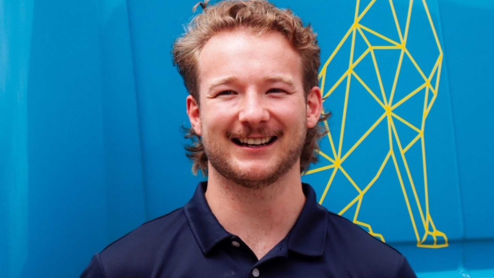 Tom, canine physiotherapist, with a dog