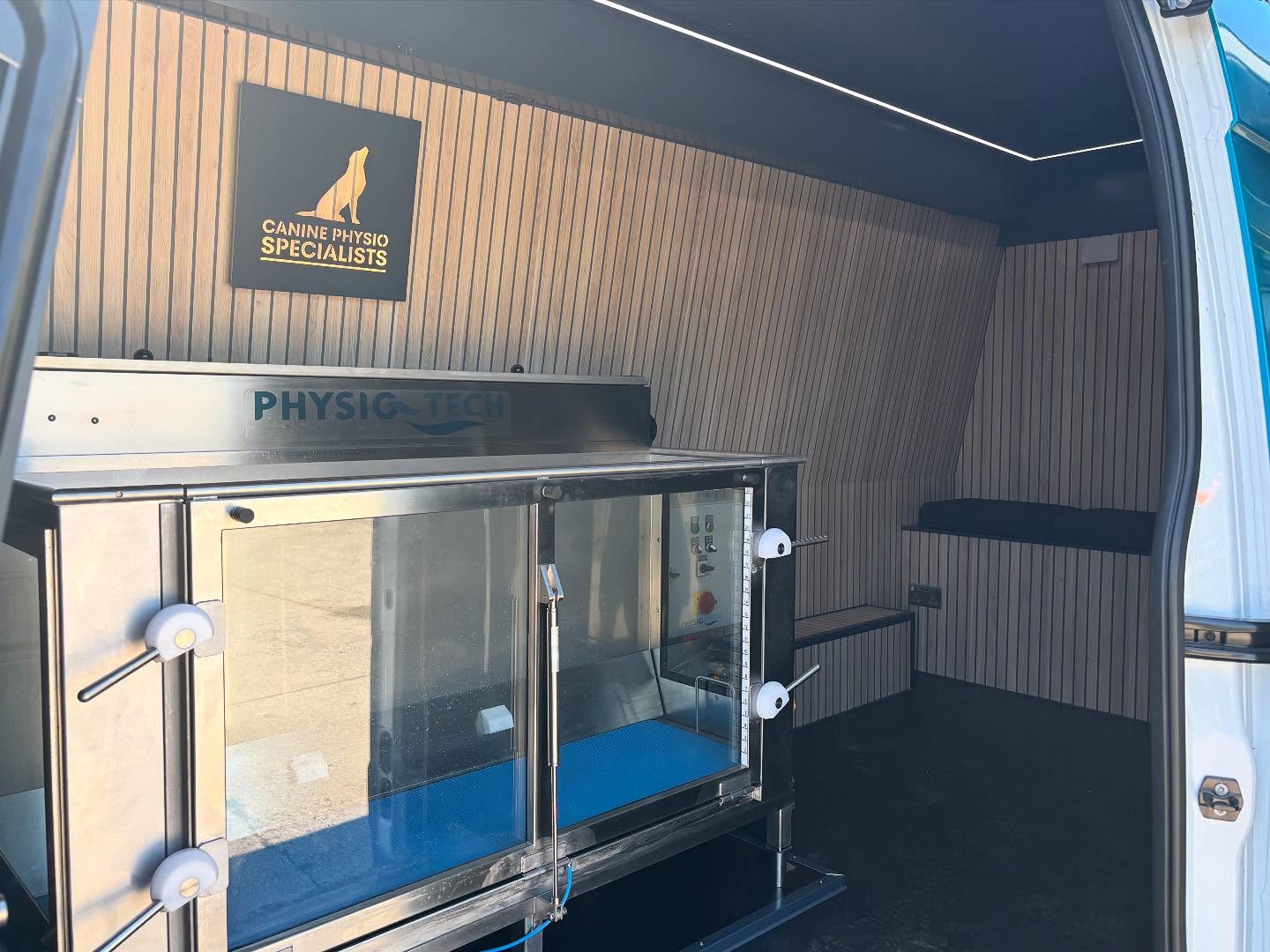 Underwater treadmill and hydrotherapy unit inside the clinic vehicle